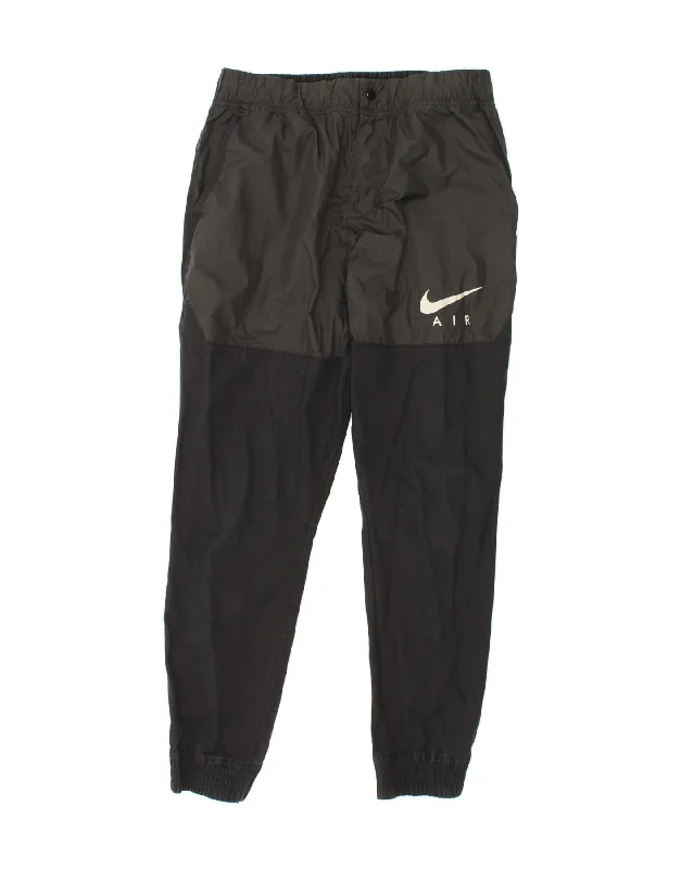 Stylish Ease NIKE Womens Tracksuit Trousers Joggers UK 14 Large Black Colourblock